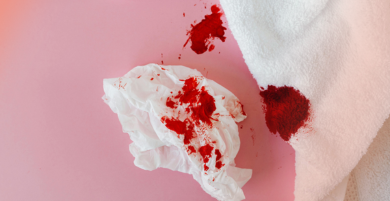 White towel and tissue stained with period blood