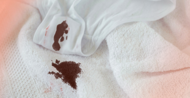 A brown stain is present on white underwear
